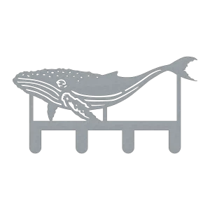 A laser-cut steel wall hook featuring a detailed design of a humpback whale, with textured cuts for fins and tail, and four sturdy hooks extending from the bottom. The metallic grey finish contrasts against a black background, highlighting the intricate whale pattern and sleek, modern design.